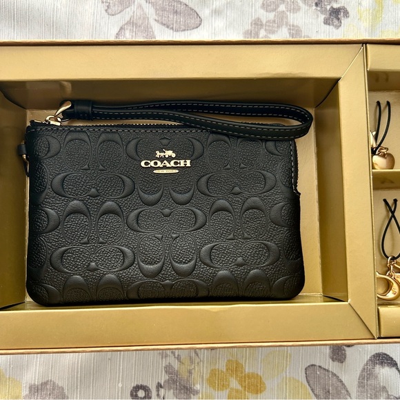 Coach Handbags - Coach Wristlet Black With Charms